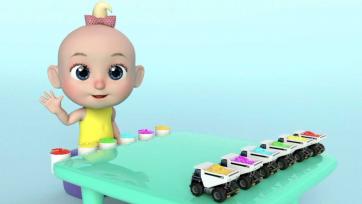 Baby Lily learns the colours with the help of trucks